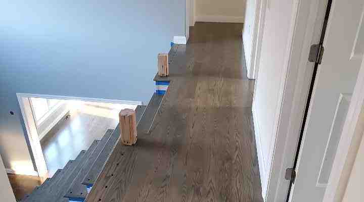 Solid or Engineered? Navigating Hardwood Floor Installation on Concrete Slabs